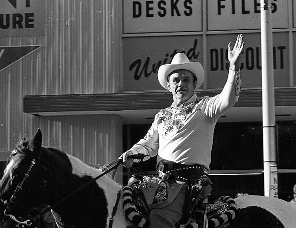 Kirby riding Calico in the 1974 Carousel Parade