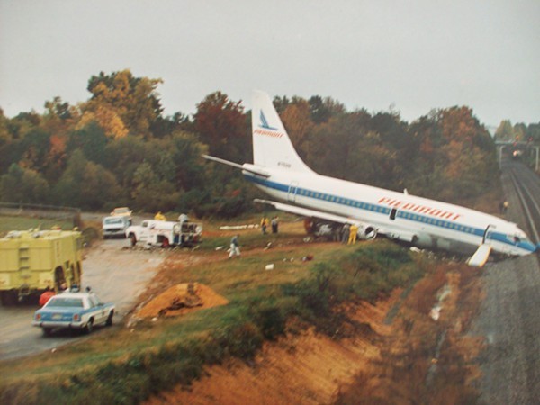 Piedmont Airlines Flight 467, seen here after slamming nose-first into railroad tracks 440 feet past the runway.