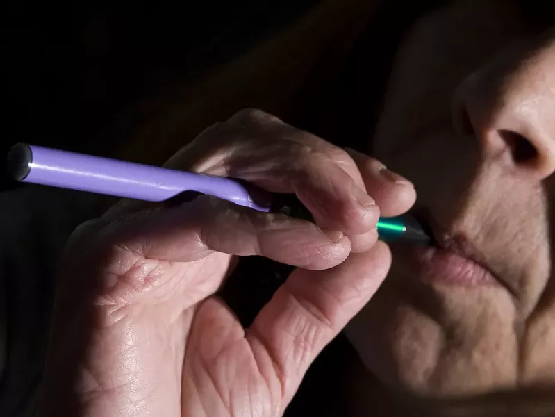 E-cigarette user Karen Sacco - YOUNG KWAK