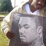 Watch Ray-J walk into a Detroit strip club, protected by an AR-15