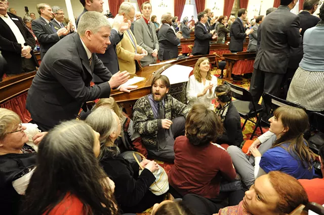 Public Safety Commissioner Keith Flynn addresses protesters during Gov. Peter Shumlin's inauguration. - JEB WALLACE-BRODEUR