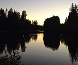 PHOTO BY CORBIN GENTZLER. - Mirror Pond--before the leak--at sunset.