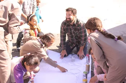 Rise Ups director, Jesse Roberts, works with Palestinian youth in November, amidst the fighting between Hamas and Israel. Rise Ups director, Jesse Roberts, works with Palestinian youth in November, amidst the fighting between Hamas and Israel.