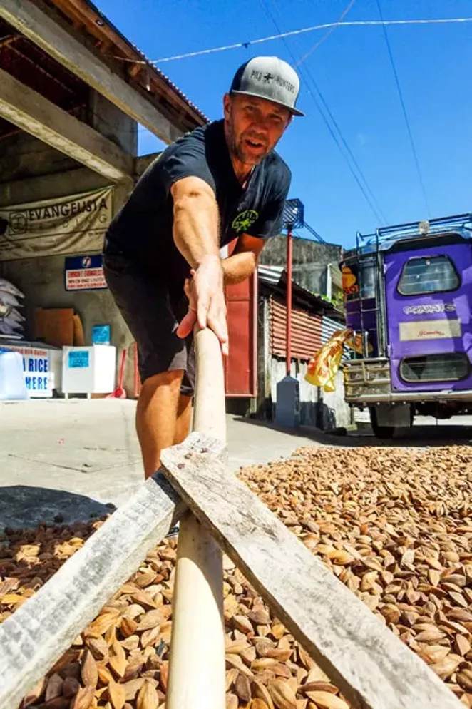 Jason Thomas works the pili nut harvest in the Philippines. - PILI HUNTERS