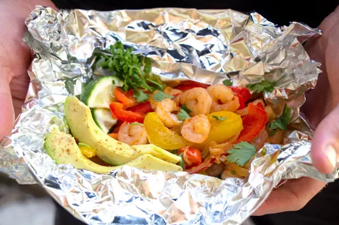 Fajitas can be prepped in foil packets and cooked on a grill for easy cleanup. - KEELY DAMARA