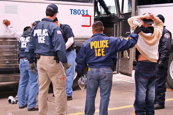 ICE agents with some of the suspects arrested in operation "Night Moves." - PHOTO COURTESY OF ICE
