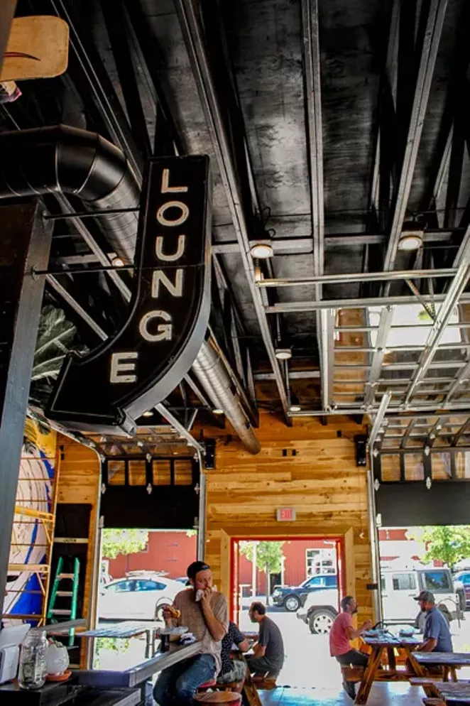 Indoor seating for all-weather dining. - NANCY PATTERSON