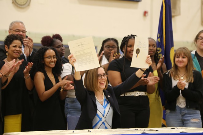 Gov. Kate Brown officially signed the Student Success Act into law in May, but did a ceremonial signing on the first day of school for Portland Public Schools students. - OFFICE OF GOV. KATE BROWN