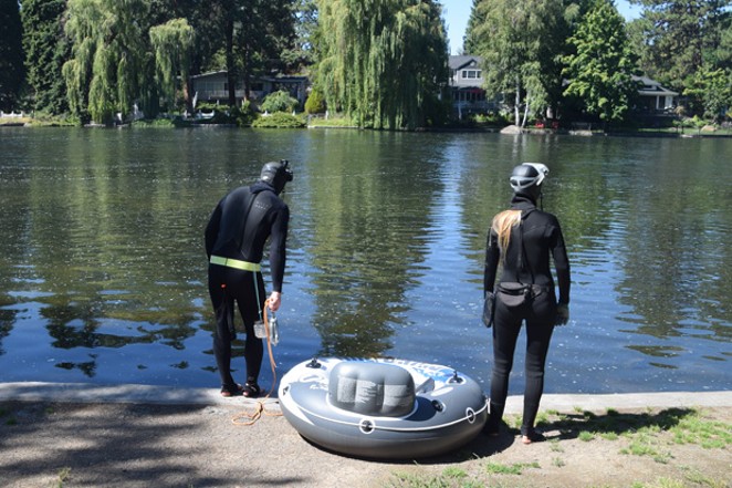 Kea Eubank & Miranda Campbell prepare to dive in the water at Pioneer Park. - ISAAC BIEHL