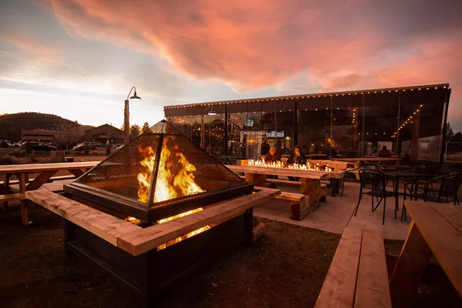 Enjoying some delicious food and brews by the fire is never a bad idea. - COURTESY OF ON TAP
