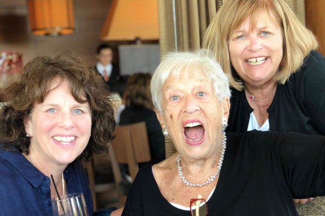 Gert Boyle, center, in typical exuberant fashion, poses with daughter Sally, left, and Kathy, right. - COURTESY KATHY DEGGENDORFER