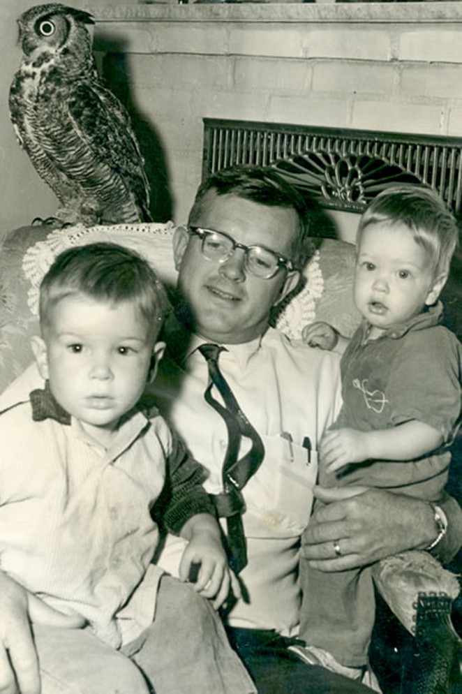 The author and his "feathered foster son," Owl, and his other sons, Dean and Ross. - HARRIET ANDERSON