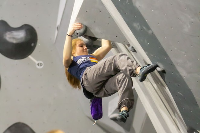 A young climber gets into her moves at Bend Rock Gym. - DIANA NAGAI