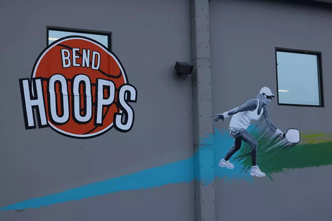 Eye-catching murals on the Bend Hoops building. - DAMIAN FAGAN