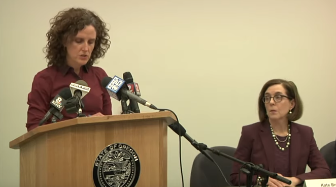 Dr. Jennifer Vines, tri-county health officer for Clackamas, Multnomah and Washington counties, with Gov. Kate Brown at Friday's press confence. - OHA