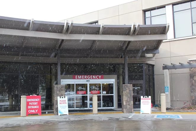 The entrance to the emergency department at St. Charles Medical Center in Bend on a snowy afternoon this winter. - FILE PHOTO - LAUREL BRAUNS