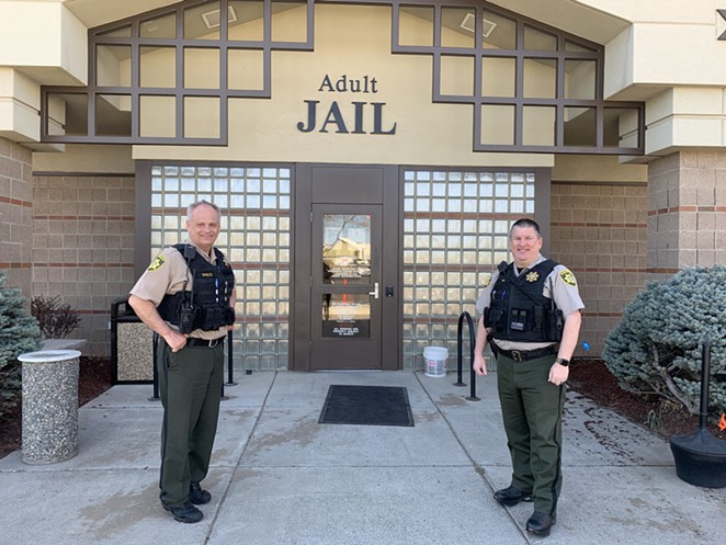 From left: Captain Michael Shults and Lieutenant Michael Gill stand in front of the Deschutes County Adult jail. - MICHAEL SHULTS