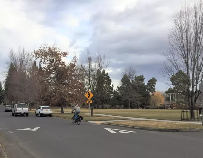 A cyclist rides past Harmon Park on NW Harmon Boulevard. - CITY OF BEND