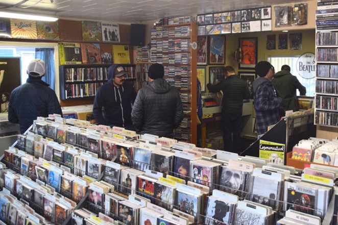 Music listeners and collectors arrive early as possible to Recycle Music on Record Store Day 2019. - ISAAC BIEHL