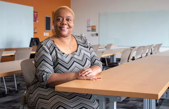 Erika McCalpine in a classroom at OSU-Cascades, during the Source's 2019 Woman of the Year photo shoot. - KEELY DAMARA