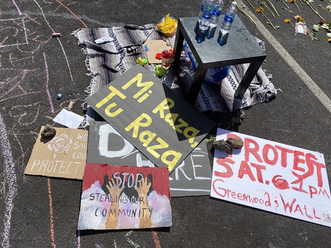 Signs left at the scene of the ICE protest in Bend the following day. - NICOLE VULCAN