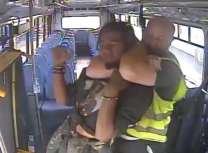 Michael Lee Brinster on the right has Dorian Zane Allstot on the left in a chokehold as he drags him off a Cascades East Transit bus on Aug. 20 for not wearing shoes. - SCREENSHOT VIA FOOTAGE FROM CASCADES EAST TRANSIT