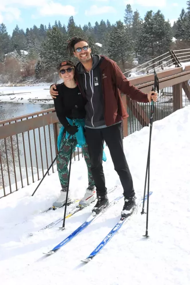 Sophia Blue and Blakelee Evans basking in the snow on skis, right in town. - DAMIAN FAGAN