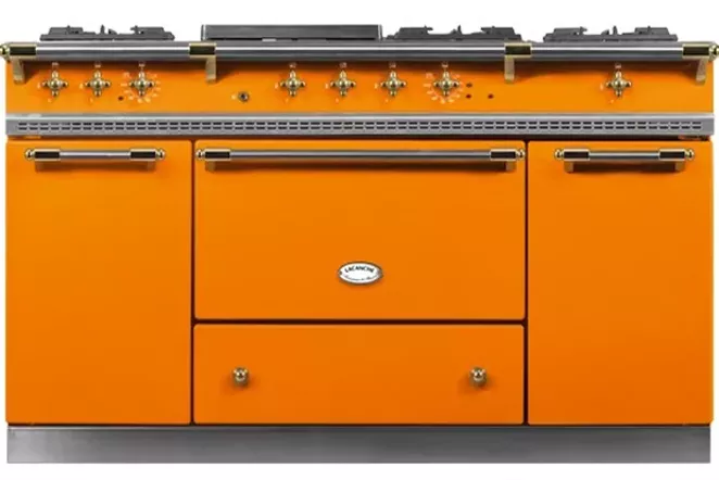 An ornate orange range inspired by a former San Francisco row house resident is chosen in one of Rossi's projects as the centerpiece to a kitchen diverging from the farm chic look. - COURTESY KERRI ROSSI