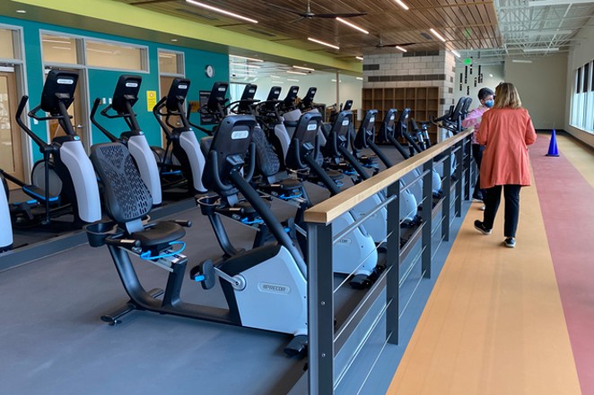The fitness center includes an indoor walking/jogging track, as well as fitness equipment users can sync with an app to track fitness data. - NICOLE VULCAN