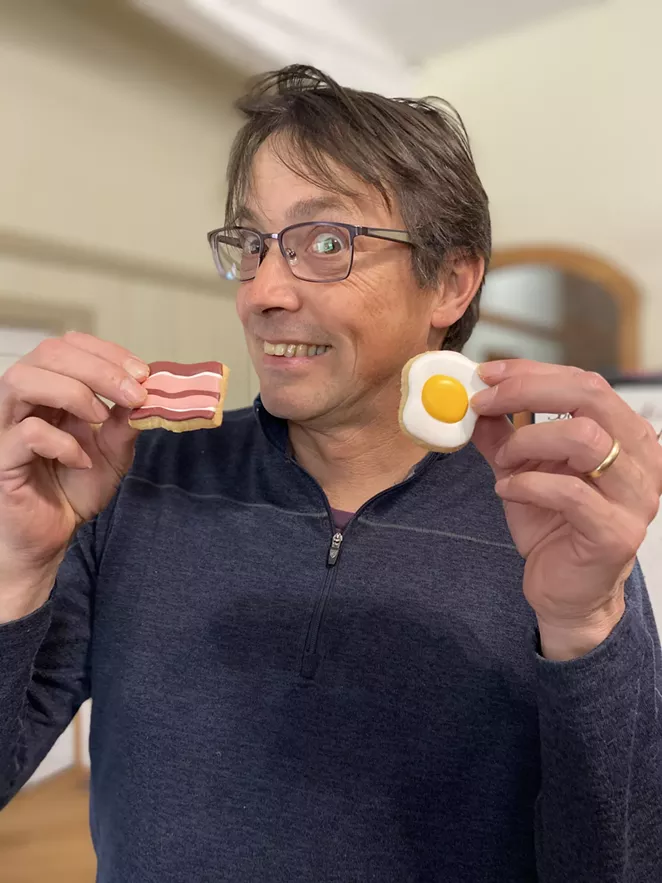 Publisher Aaron Swtizer was the proud gobbler of the bacon and eggs cookies—even funnier because he's a vegetarian. - SOURCE WEEKLY
