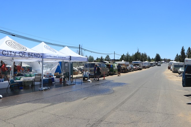 About 80-100 people have set up camp on Hunnell Road in Bend, Oregon. The area is especially susceptible to problems with the heat due to lack of shade and the hot asphalt. - JACK HARVEL