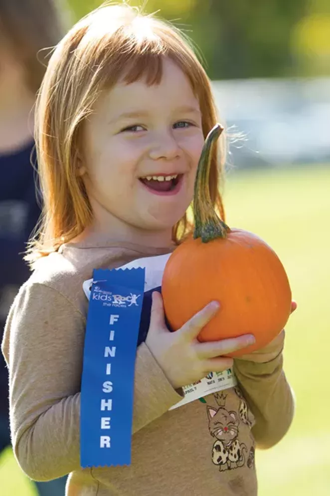All runners receive a pumpkin at the Kid’s Harvest Run at Bend Fall Festival! - BRIAN BECKER