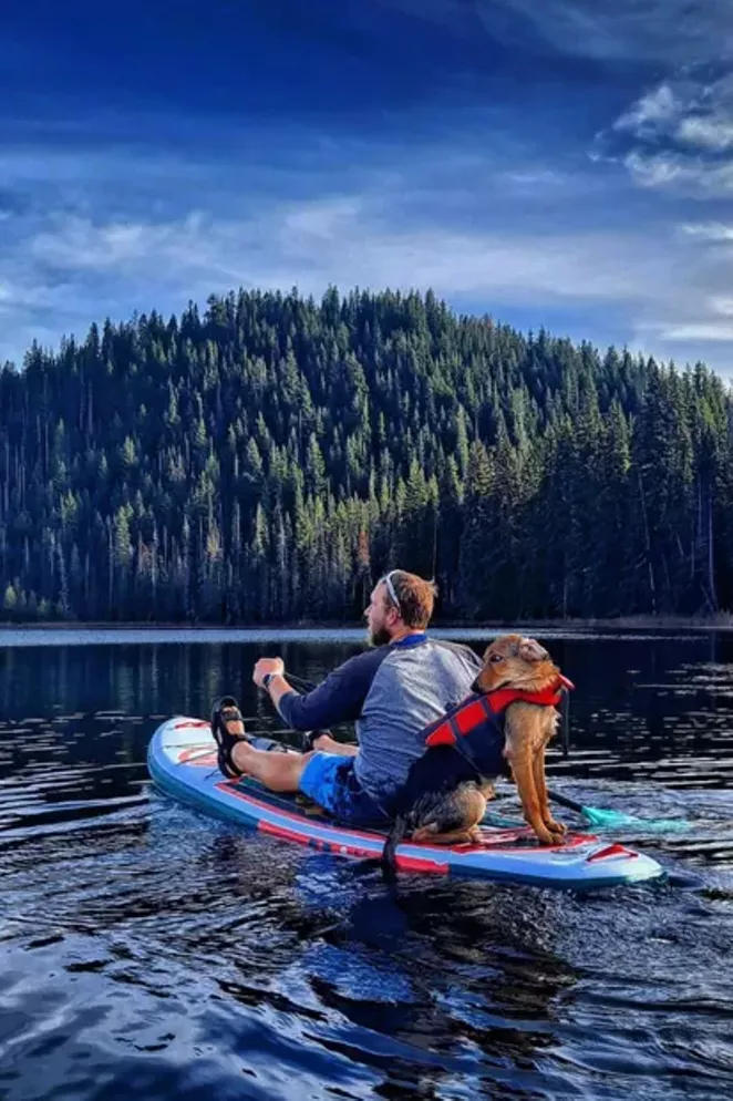 Hosmer Lake is a chill place to take your thoughts, paddle board... and dog!? @bettybluerescue shared this shot of a paddle boarder and his loyal companion soaking up the sun out on the lake. - COURTESY @BETTYBLUERESCUE/INSTAGRAM