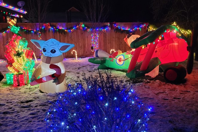 Snoopy is ready to take flight and Baby Yoda is ready for a huge snack at this extravagant Christmas display mash-up. - COURTESY TREVOR BRADFORD