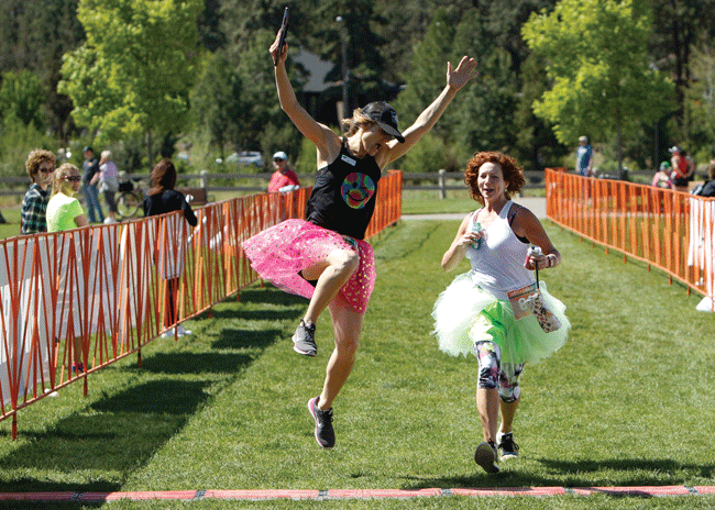 Happy Girls jump for joy! - BRIAN BECKER