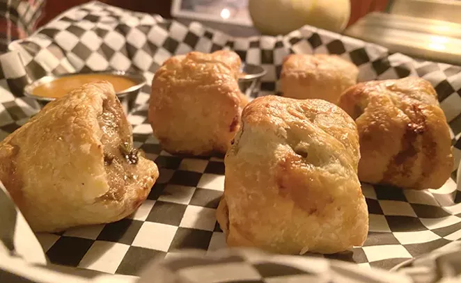 The Cellar's meat pies pair perfectly with its smooth brews. - JARED RASIC