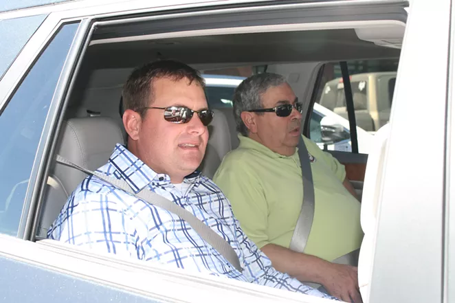 Bend Mayor Casey Roats and Redmond Mayor George Endicott buckle up Wednesday, for Uber's inaugural ride in Central Oregon. Service begins for the public 10 am Thurs., May 4. - NICOLE VULCAN
