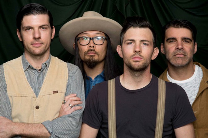 FROM LEFT, SETH AVETT, JOE KWON, SCOTT AVETT AND BOB CRAWFORD, ALONG WITH THREE OTHER BAND MEMBERS, PLAY LSA THIS FRIDAY.