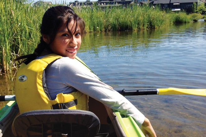 Nancy Gonzalez bravely navigating the Deschutes River. - K.M. COLLINS
