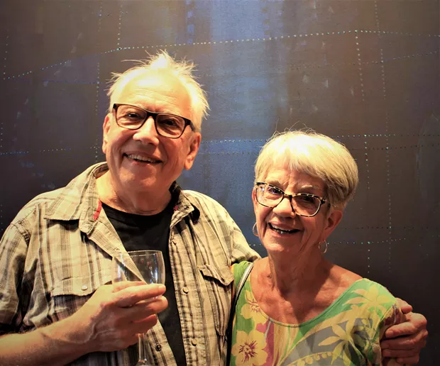 Bill Hoppe and Sandy Anderson standing in front of "West Went," created by Hoppe in 2015. - DANIELLE MEYERS