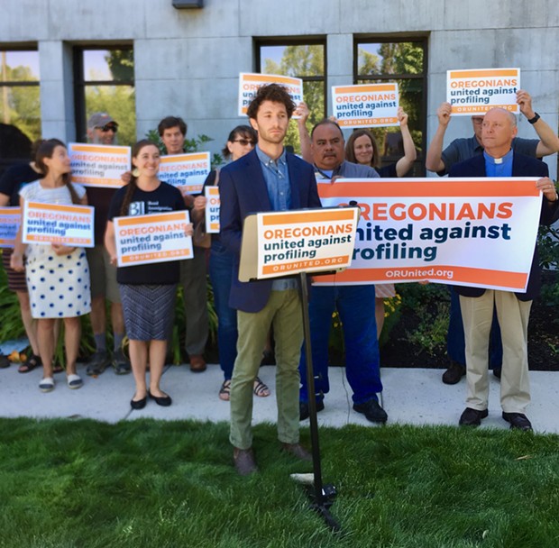 Noah Goldberg-Jaffe of the Oregon AFL-CIO speaks at the Deschutes County Courthouse on July 9. - CHRIS MILLER