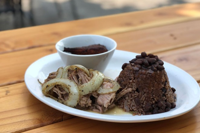 Puerco asado is considered a national Cuban dish. - LISA SIPE