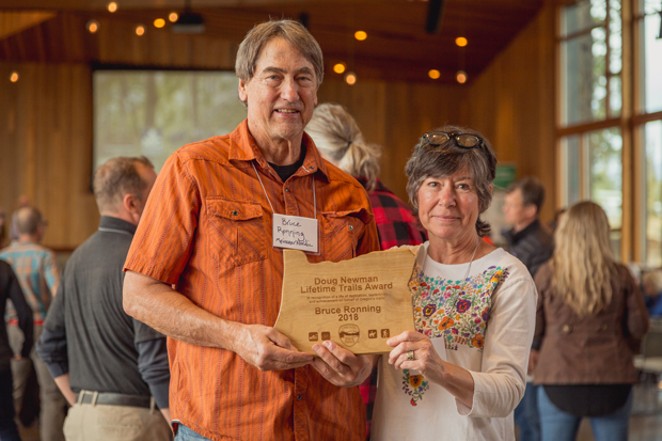 Bruce Ronning shows off his award at the Oregon Trail Summit. - GABRIEL AMADEUS TILLER