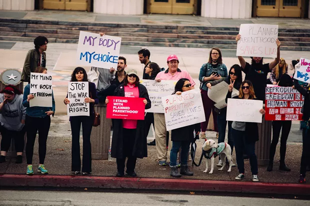 Protestors rally in support of Planned Parenthood in Los Angeles, 2017. - MOLLY ADAMS, FLICKR