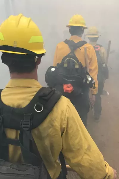 Firefighters work on a prescribed burn near Sisters, Ore. in June 2018. - PROJECT WILDFIRE