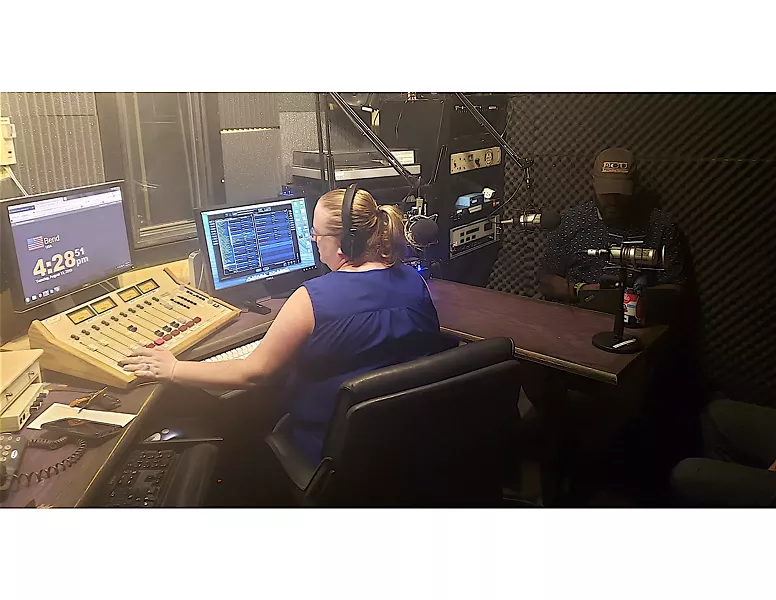 Katy Ipock, former KURT 93.7 host, interviews guest Johnny Alfredo for a recent KPOV broadcast. - CAYLA CLARK