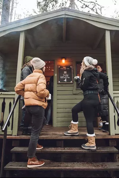 Beer festers bounced around between cabins, specialty brews and smoking grills. - CHEW & TASTE PHOTOGRAPHY