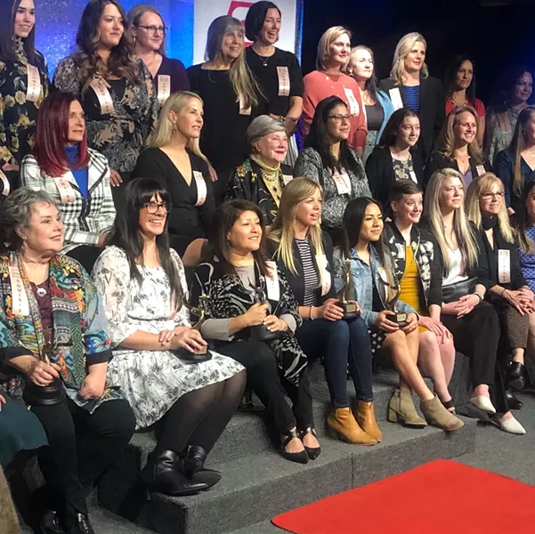 Winners and nominees pose for a group photo at the Women of the Year awards ceremony Feb. 28. - NICOLE VULCAN