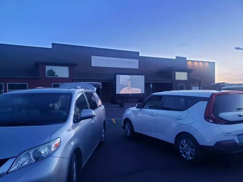Families gather in Prineville to watch "Pete's Dragon" from their cars. - CAYLA CLARK