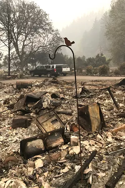 Kiger Plews' home in Vida, Oregon—along with the homes of other members of his family were devastated in the Holiday Farm Fire. - KIGER PLEWS